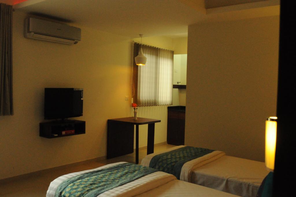 อิกโซร่า สวีทส์ Aparthotel บังกาลอร์ ห้อง รูปภาพ